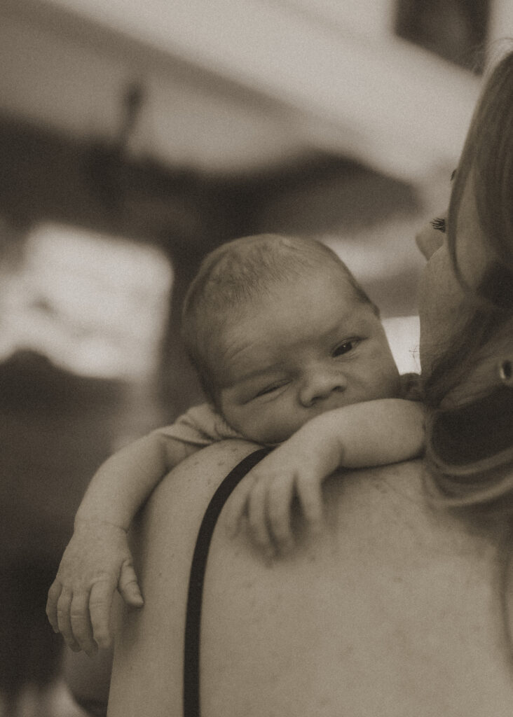 cincinnati newborn photography capturing sleepy newborn baby during in home lifestyle session