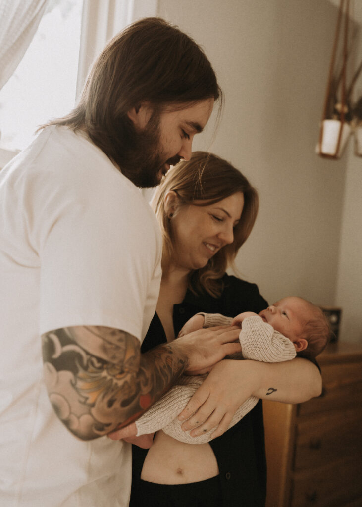 family during in home newborn lifestyle session