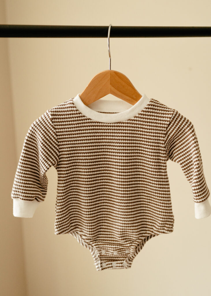 Cincinnati newborn photographer Sun & Vine Photography newborn closet outfits for in home newborn lifestyle photography sessions