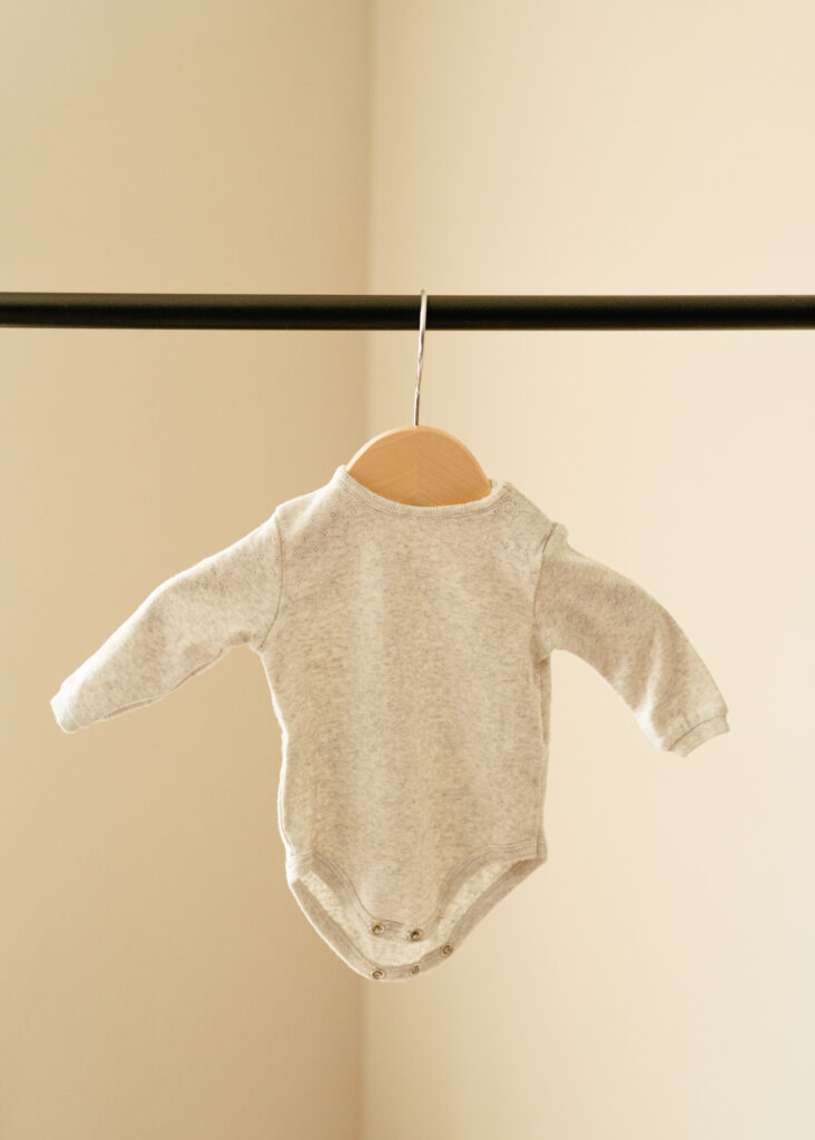 Cincinnati newborn photographer Sun & Vine Photography newborn closet outfits for in home newborn lifestyle photography sessions