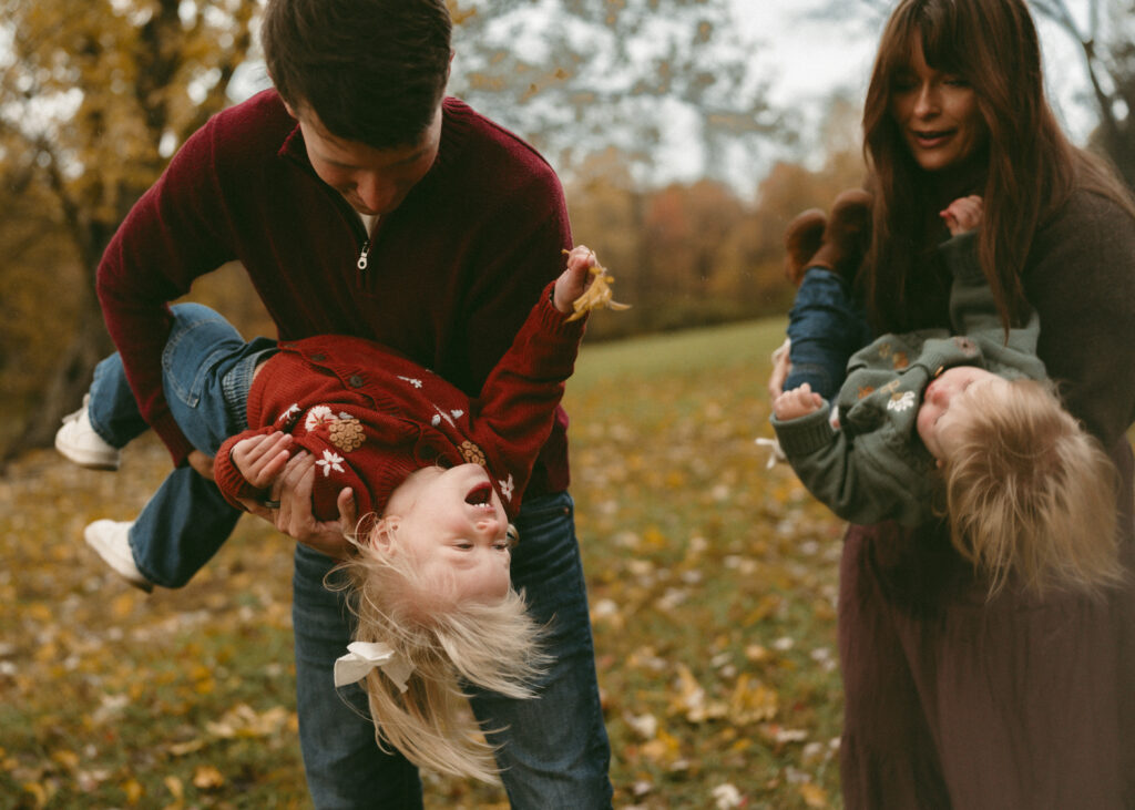 parents playing with their toddlers during family photography lifestyle session