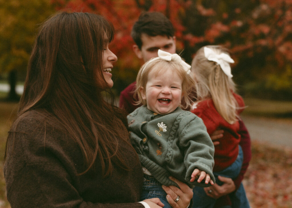 toddler laughing during family photo session